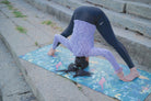 forward fold on beatiful yoga mat in mysore