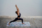warrior pose in mysore on printed yoga mat by kosha yoga co
