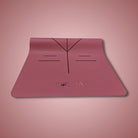 pink yoga mat with alignment lines and natural rubber for extra grip