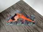 Yoga Teacher on tropical print mat by kosha yoga co