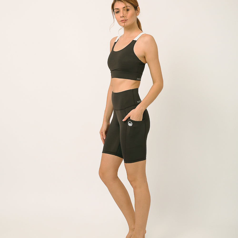 Black Biker shorts and sports bra for yoga, gym, workouts, running made by kosha yoga co from recycled materials