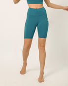 Sustainable activewear made out of recycled materials by Kosha Yoga Co. Squat proof, stretchable biker shorts for yoga, gym, workouts, running.