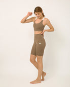 Sustainable activewear made out of recycled materials by Kosha Yoga Co. Squat proof, stretchable biker shorts for yoga, gym, workouts, running.