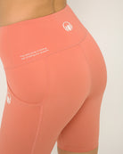 Pink squat proof shorts for yoga and sports bra yoga set by kosha yoga co