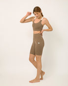 Nude Biker shorts and sports bra for yoga, gym, workouts, running made by kosha yoga co from recycled materials