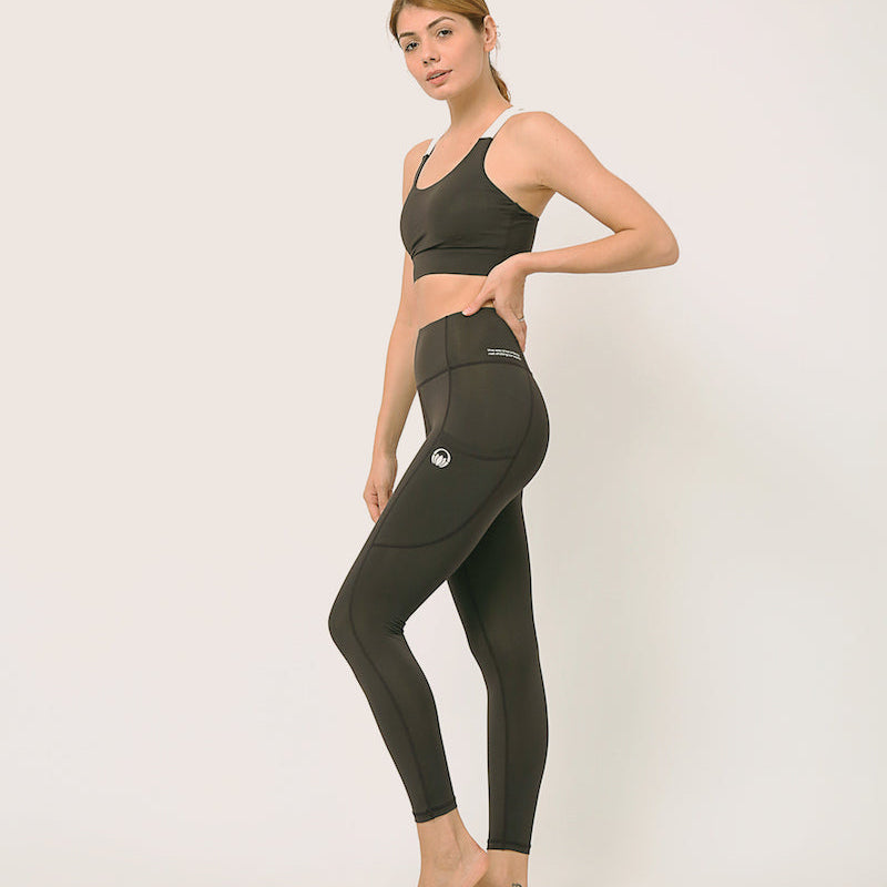Black yoga pants and sports bra for yoga, gym, workouts, running made by kosha yoga co from recycled materials