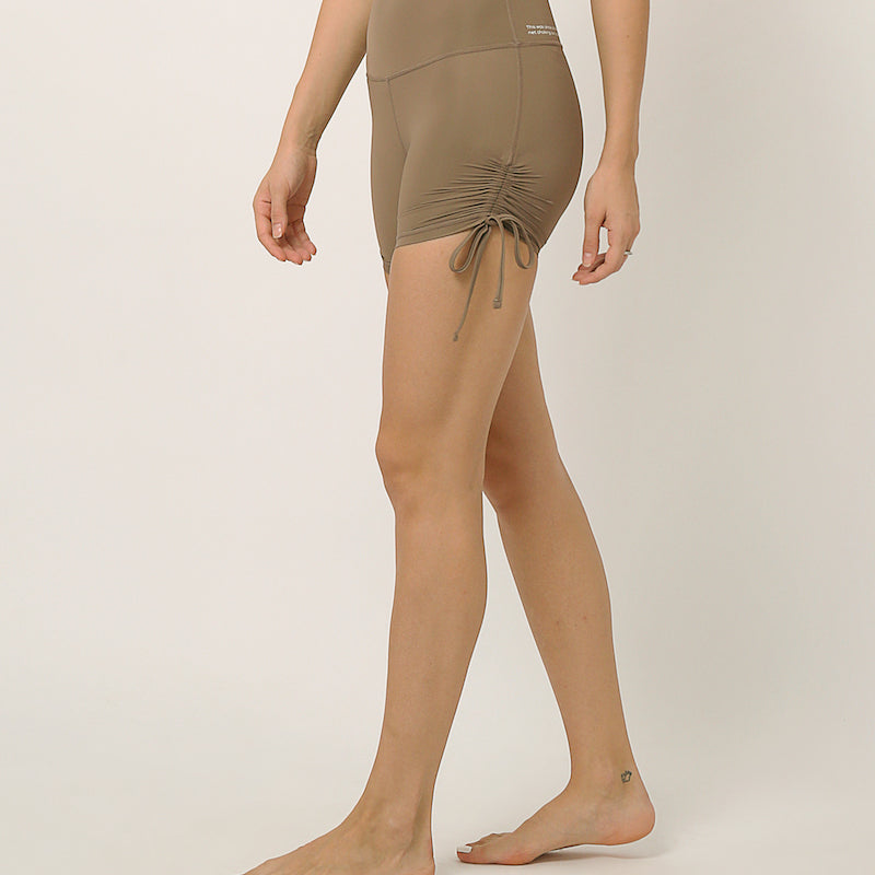 Nude moisture wicking shorts with adjustable length by kosha yoga co