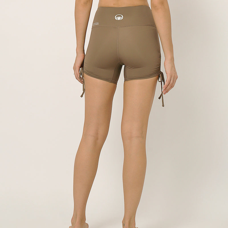 yoga set with sports bra and shorts by kosha yoga co in nude