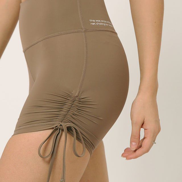 Nude squat proof shorts with adjustable length for yoga and sports bra yoga set by kosha yoga co
