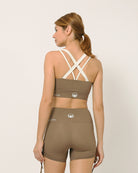 Sustainable activewear made out of recycled materials by Kosha Yoga Co. Squat proof, stretchable sports bras for yoga, gym, workouts, running.