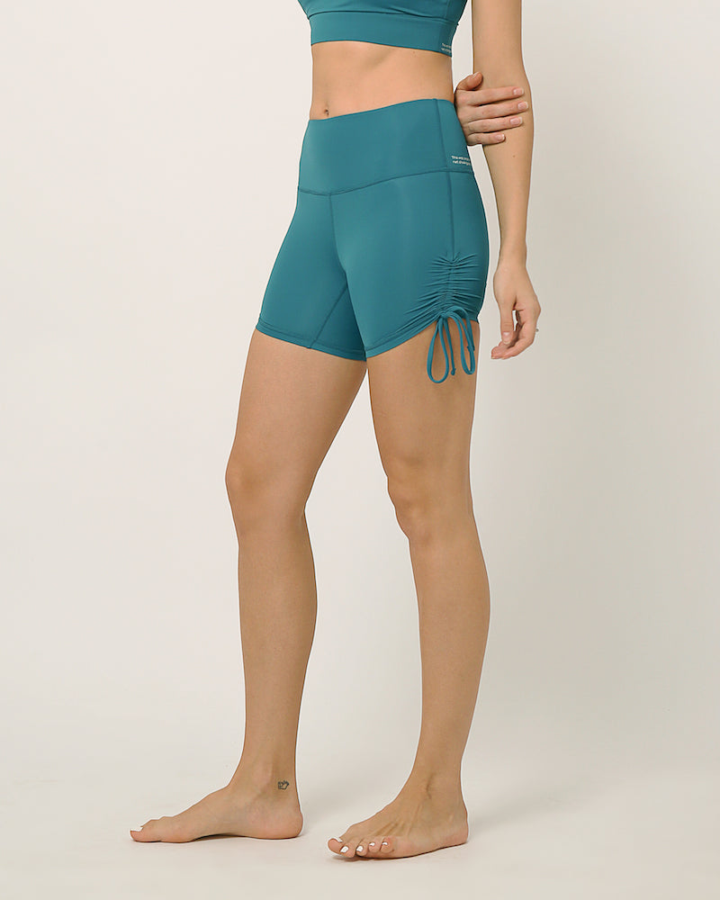 Sustainable activewear made out of recycled materials by Kosha Yoga Co. Squat proof, stretchable shorts for yoga, gym, workouts, running.