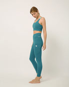 Sustainable activewear made out of recycled materials by Kosha Yoga Co. Squat proof, stretchable leggings for yoga, gym, workouts, running.