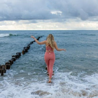 Sustainable activewear made out of recycled materials by Kosha Yoga Co. Squat proof, stretchable leggings for yoga, gym, workouts, running.