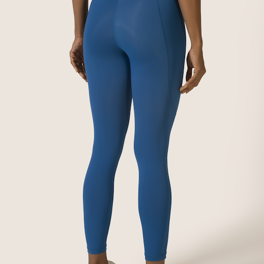 Sustainable activewear made out of recycled materials by Kosha Yoga Co. Squat proof, stretchable leggings for yoga, gym, workouts, running.