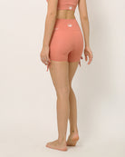Pink moisture wicking shorts with adjustable length by kosha yoga co