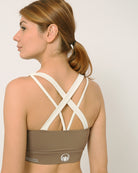 Nude and white sports bra co-ord set with contrast straps for yoga, gym, workouts, running made by kosha yoga co from recycled materials