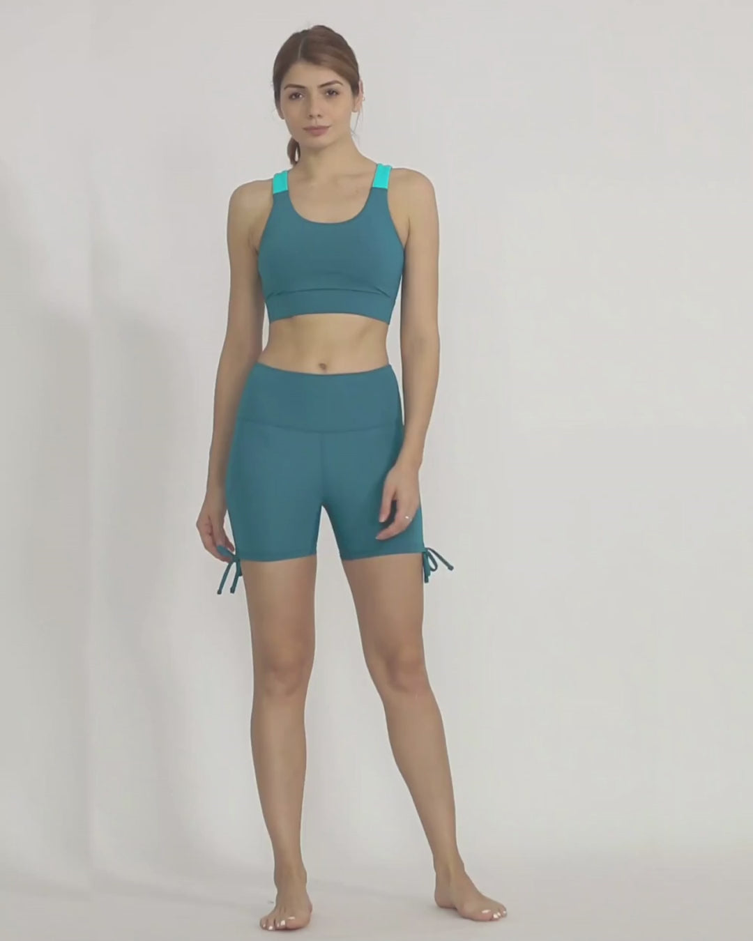 Green sports bra with wide strap and removable cups by kosha yoga co India