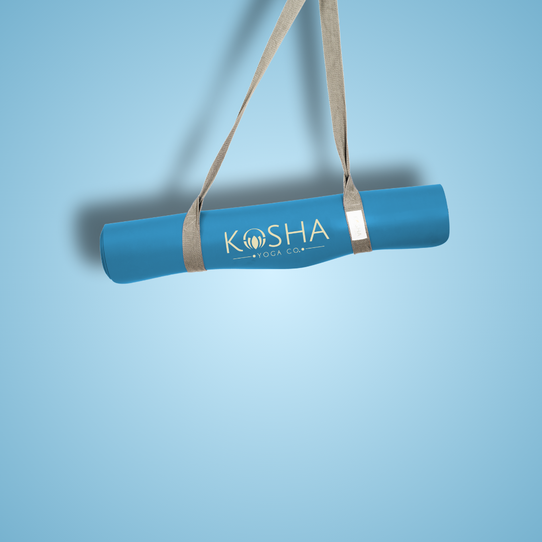 blue colour natural rubber yoga mat with free carry strap by kosha yoga co India for men and women