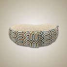 Decorative half moon pillow with geometric pattern 
