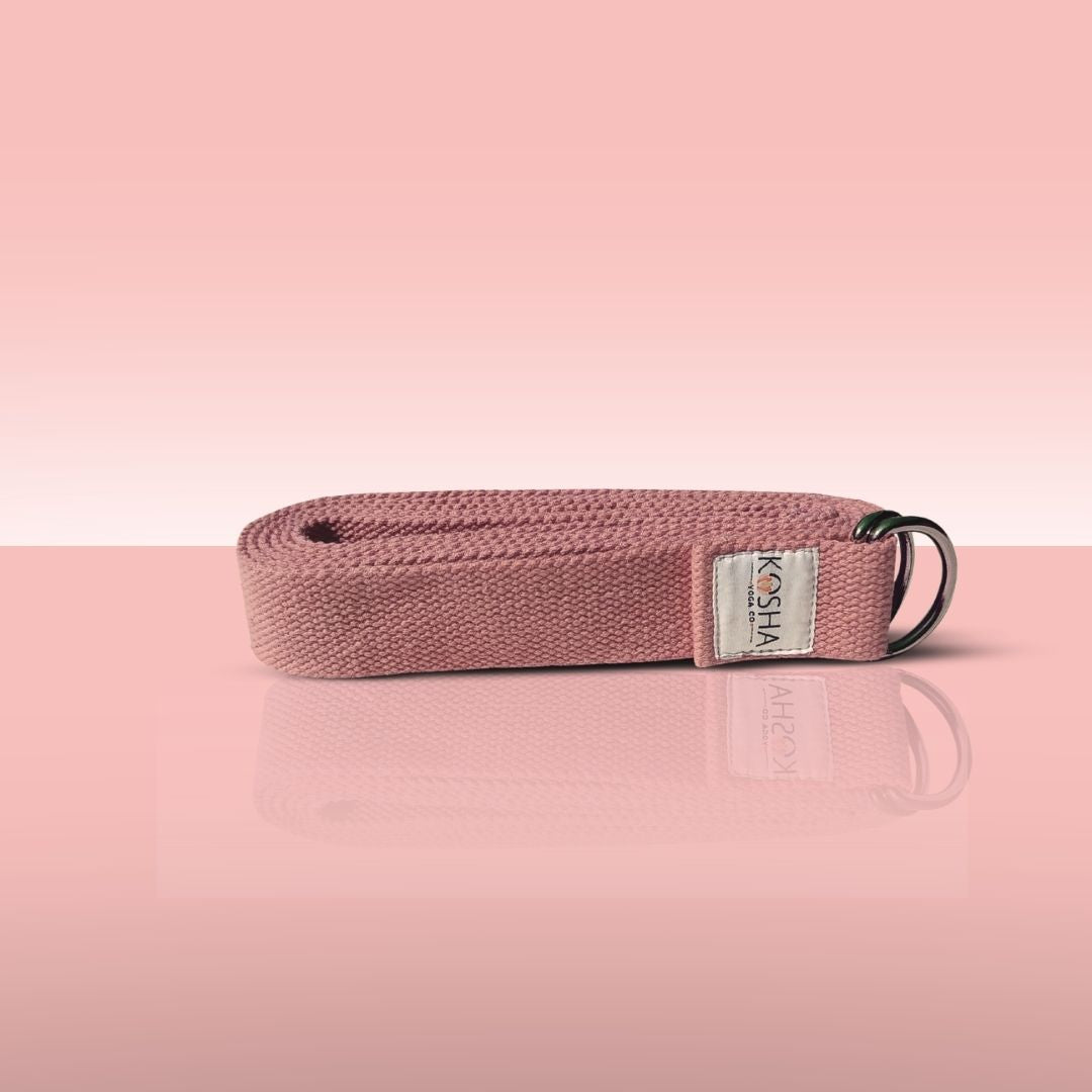 yoga strap with buckle made from organic cotton in peach colour by kosha yoga co