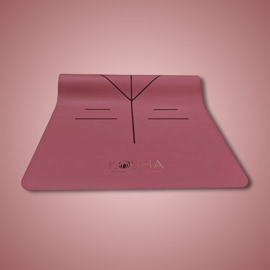pink yoga mat with alignment lines and natural rubber for extra grip