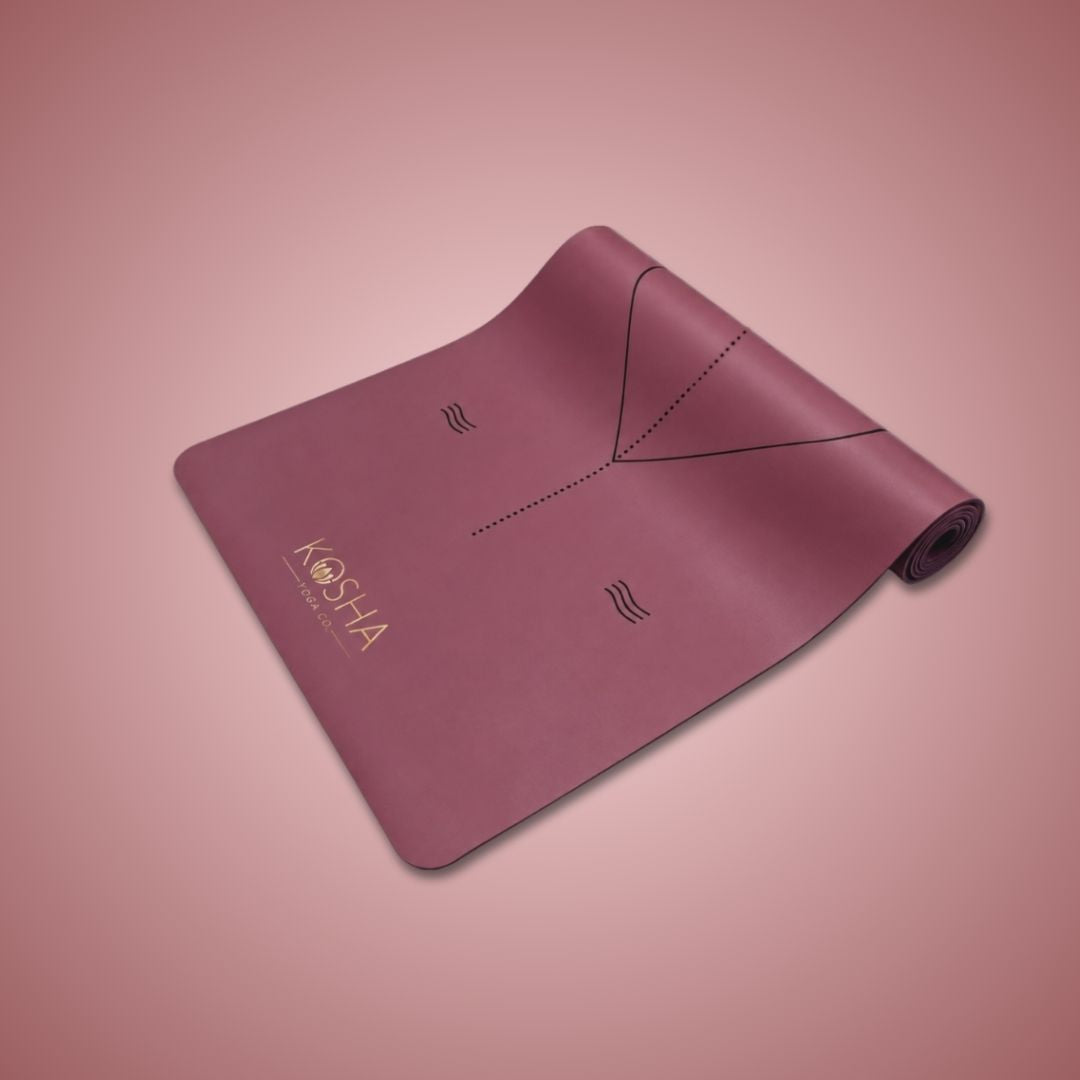 pink yoga mat with alignment lines and natural rubber for extra grip