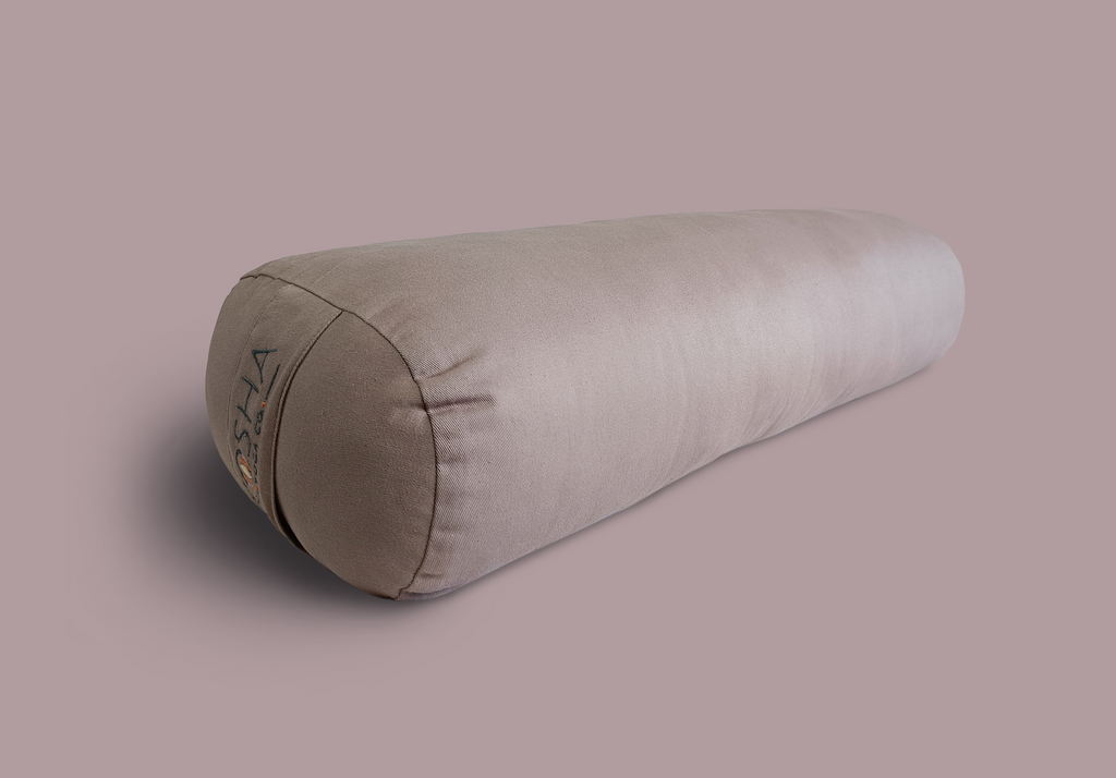 Yoga bolster with carry strap for restorative yoga in beige colour