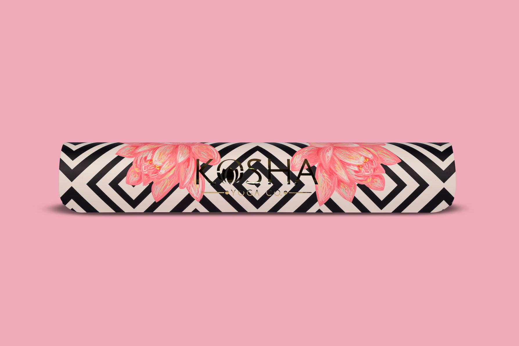 printed lotus yoga mat by kosha yoga co with black and pink flowers