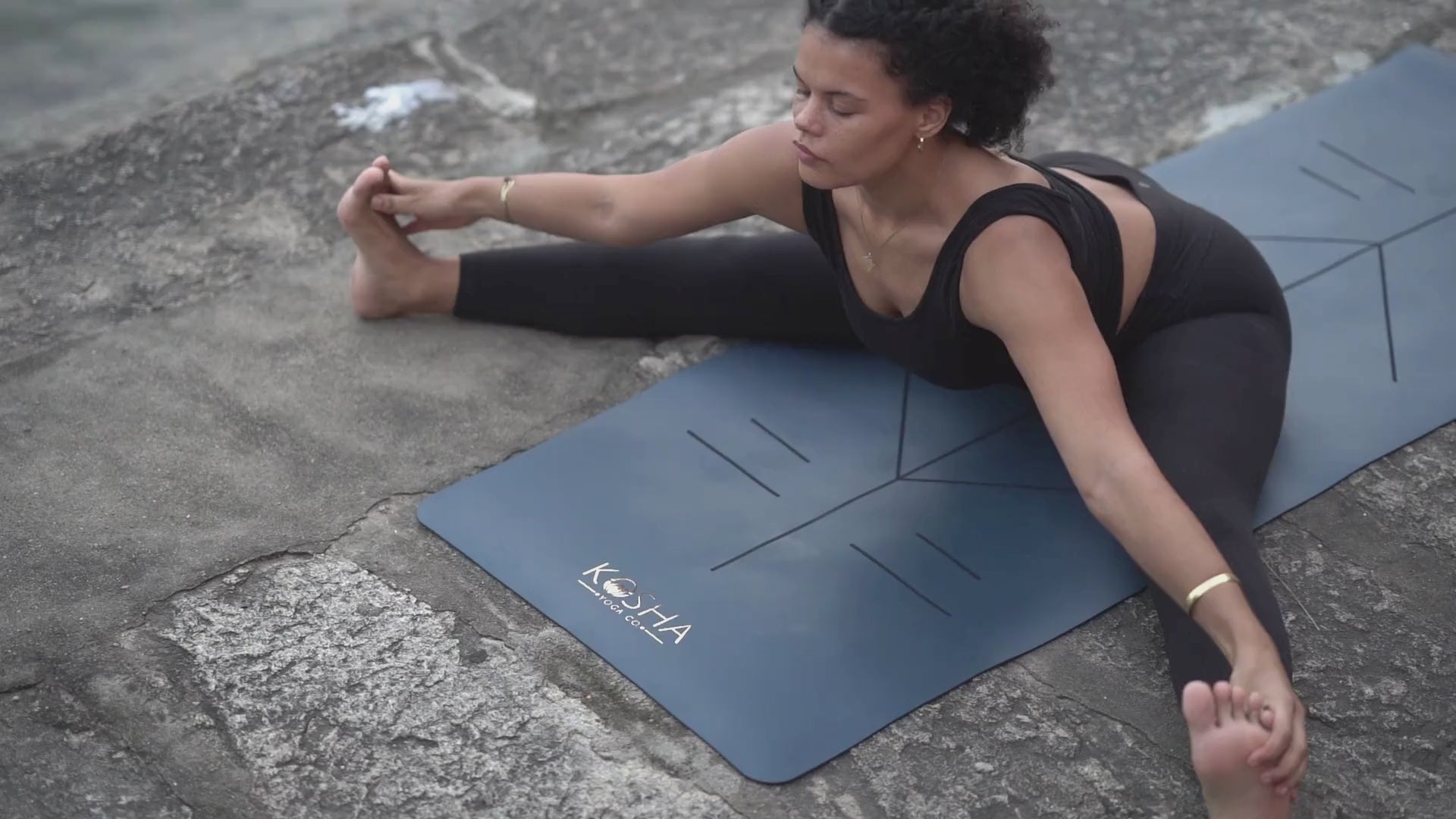 blue yoga mat with alignment lines and natural rubber for extra grip