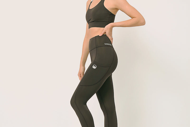Black yoga pants and sports bra for yoga, gym, workouts, running made by kosha yoga co from recycled materials