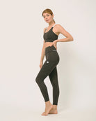 Black yoga pants and sports bra for yoga, gym, workouts, running made by kosha yoga co from recycled materials