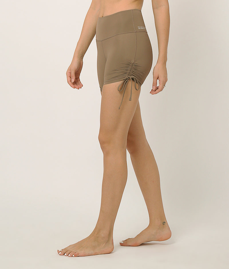 Nude moisture wicking shorts with adjustable length by kosha yoga co
