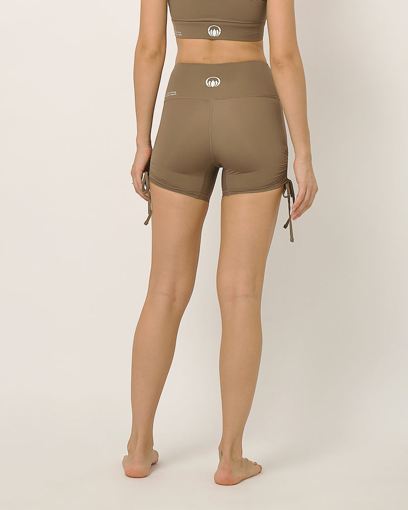 yoga set with sports bra and shorts by kosha yoga co in nude