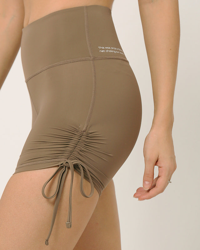 Nude squat proof shorts with adjustable length for yoga and sports bra yoga set by kosha yoga co