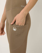 Nude moisture wicking yoga pants with two pockets by Kosha yoga co