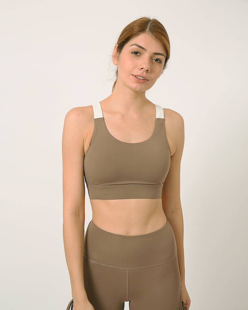 Sustainable activewear made out of recycled materials by Kosha Yoga Co. Squat proof, stretchable sports bras for yoga, gym, workouts, running.
