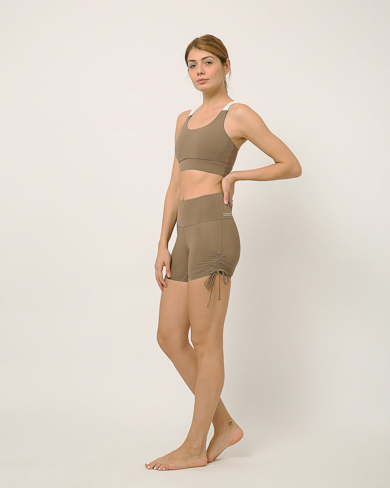 Nude yoga shorts and sports bra for yoga, gym, workouts, running made by kosha yoga co from recycled materials