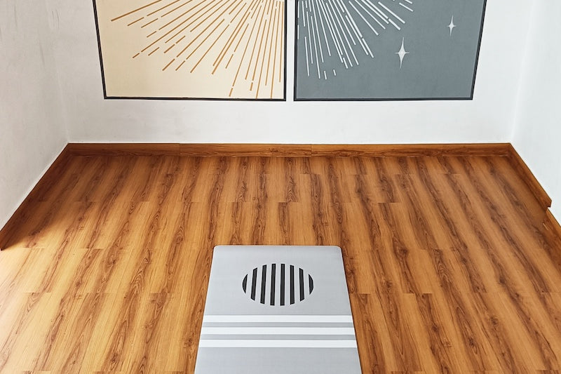 minimal print yoga mat in a studio by kosha yoga co 