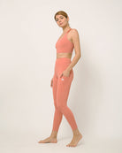 Pink yoga pants and sports bra for yoga, gym, workouts, running made by kosha yoga co from recycled materials