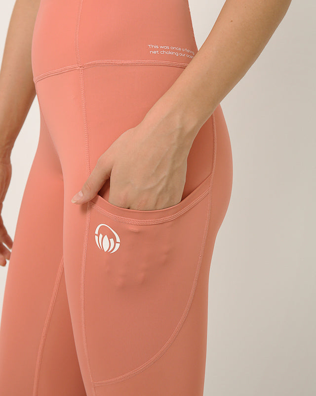 Pink moisture wicking yoga pants with two pockets by Kosha yoga co