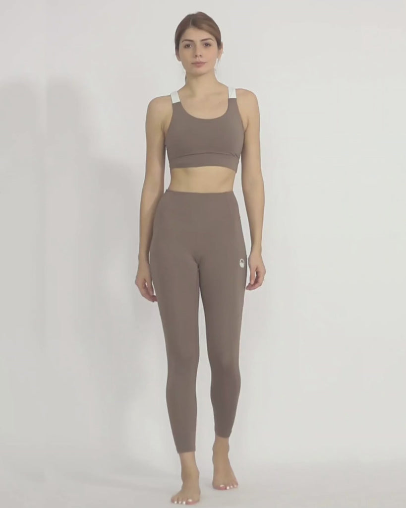 Nude yoga pants and sports bra co-ord set by kosha yoga co from recycled materials